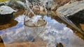 Water splash with a reflection clouds