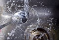 Water Splash on Spoon Royalty Free Stock Photo