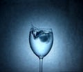 Water Splash in Vine Glass Royalty Free Stock Photo