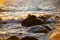 Water splashes against rocks, troubled sea, spray Royalty Free Stock Photo