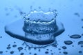 Water splashes on glass on a blue background3 Royalty Free Stock Photo