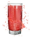 Water splashes in red colors around a opaque glass with red juice Royalty Free Stock Photo