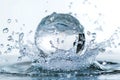 Water splashes in the shape of an isolated sphere on a white background Royalty Free Stock Photo