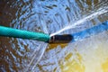 Water splashing from connection of pipe burst Royalty Free Stock Photo