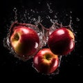 Water splashing on Fresh Red Apple