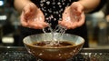 Water splashing onto hands over a bowl Royalty Free Stock Photo