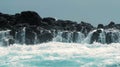 Water splashing over rocks