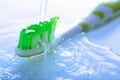 Water splashing over toothbrush Royalty Free Stock Photo