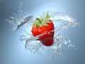 Water splashing on a strawberry Royalty Free Stock Photo