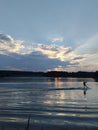 Water sport, Water skiing athlete trains on the lake, sunset on the lake