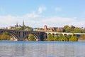 Water sports on Potomac River near Georgetown Park waterfront and key Bridge in Washington DC, USA. Royalty Free Stock Photo