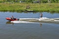 Water sports in summer water skiing on surfboard Royalty Free Stock Photo