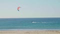 Water sports at the turquoise Mediterranean Sea. Kite surfing holiday. Southern Spain,Costa del Sol. Rising the kite