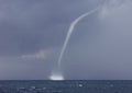 Waterspout / water spout, twister, tornado at sea Royalty Free Stock Photo