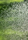 Water sprinkers in a field. Royalty Free Stock Photo