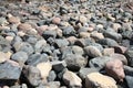 Water stones rocks pattern. Pebbles near water. Round stones background. Nature background. River bed and shore Royalty Free Stock Photo
