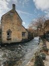 Water stream next to Halt Motoring Museum located in the picturesque village of Bourton on the Water