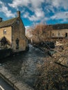 Water stream next to Halt Motoring Museum located in the picturesque village of Bourton on the Water