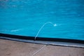 Water strips of fountain in a pool Royalty Free Stock Photo