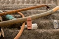 Old PVC Valve with Plastic Water Pipe/ Hose on Dirty Corrugated Roof - Moldy Concrete Texture Royalty Free Stock Photo