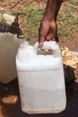 Fetching water to jerrycan, Viqueque Timor Leste