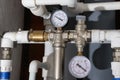 Water supply pipes with pressure gauges, valves