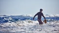 Water surf photographer get footage on a day with large waves. Water sport activity. Atlantic Ocean