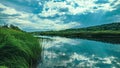 The water surface of the river with a reflection of the blue sky with clouds, green sedge along the banks. Royalty Free Stock Photo