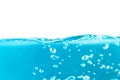 Water surface side view with bubbles and waves in the isolated background. Royalty Free Stock Photo