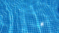 Water surface texture with looping clean swimming pool ripples and waves. Royalty Free Stock Photo