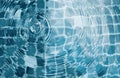 Water surface texture sunlight reflection blue wave background,Swimming pool bottom caustics ripple and flow with waves Royalty Free Stock Photo