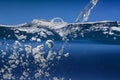 Water surface with wave and bubbles