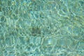 Water in swimming pool reflecting sunshine Royalty Free Stock Photo