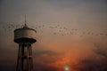 Water Tank Tower with sunset Royalty Free Stock Photo