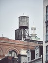 Water tanks on a roof of a building in downtown New York Royalty Free Stock Photo