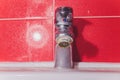 Water tap in detail with limescale close up soiled bathroom Calcified faucet.