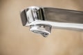 Water tap and drops of water. Water tap with dripping waterdrop. Water leaking, saving Royalty Free Stock Photo