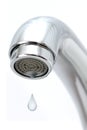 Water tap with falling water drop on white