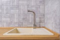 water tap sink with faucet in expensive kitchen Royalty Free Stock Photo