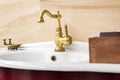 Water tap sink with faucet in vintage chinese style  in expensive loft bathroom Royalty Free Stock Photo