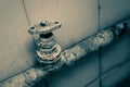 Water tap on a very old rusty pipe Royalty Free Stock Photo