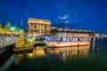 A water taxi along the Fells Point Waterfront at night, in Baltimore, Maryland Royalty Free Stock Photo