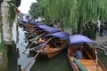 Water taxi assembly and waiting for customers beside a river in Zhou Zhuang, China. Royalty Free Stock Photo