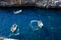 Water taxi boats in the bay, Glue Grotto. Royalty Free Stock Photo