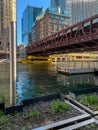 Water taxi crosses under Wells Street Bridge Royalty Free Stock Photo