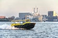 Water taxi and cruise ship Royalty Free Stock Photo