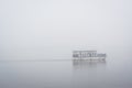 A water taxi in fog, in Fells Point, Baltimore, Maryland Royalty Free Stock Photo