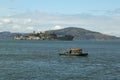 Water taxi in the front of Alcatraz island in San Francisco Bay Royalty Free Stock Photo