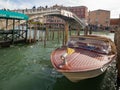 Water taxi near Ponte degli Scalzi bridge, Venice, Italy