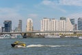 Water taxi speeding on the river in Rotterdam, Netherlands